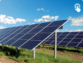 Raised level solar PV panels installed on at ground level on a farm so the ground can still be used for grazing